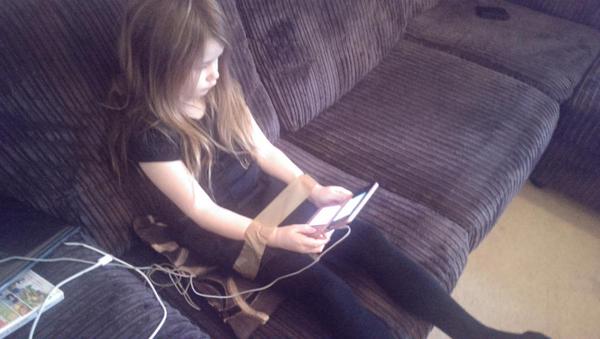 RT 21st century parenting tip #4021 - tape your child's arms to their legs to prevent holding console too close to eyes.  - embedded image 
