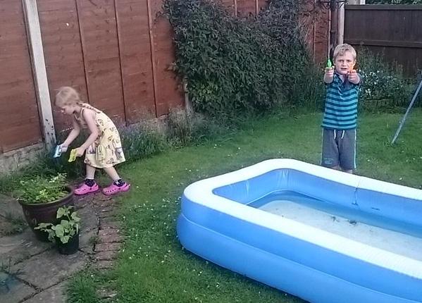 The children are on Level 53 of their Jurassic park musical battle. They have pink armour and water pistols.  - embedded image 