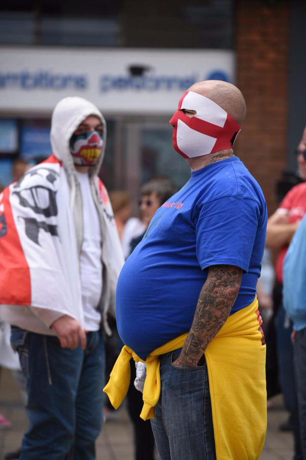 RT "Ban the burqa" they said. "It's wrong to cover their faces" they said. #EDL brain-dead arseholes in Lincoln today  - embedded image 