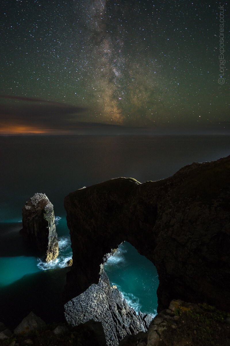 RT Final pic from Sat night: Green Bridge on @PembsCoast. Milky Way so vivid it cast subtle reflection over Celtic Sea.  - embedded image 