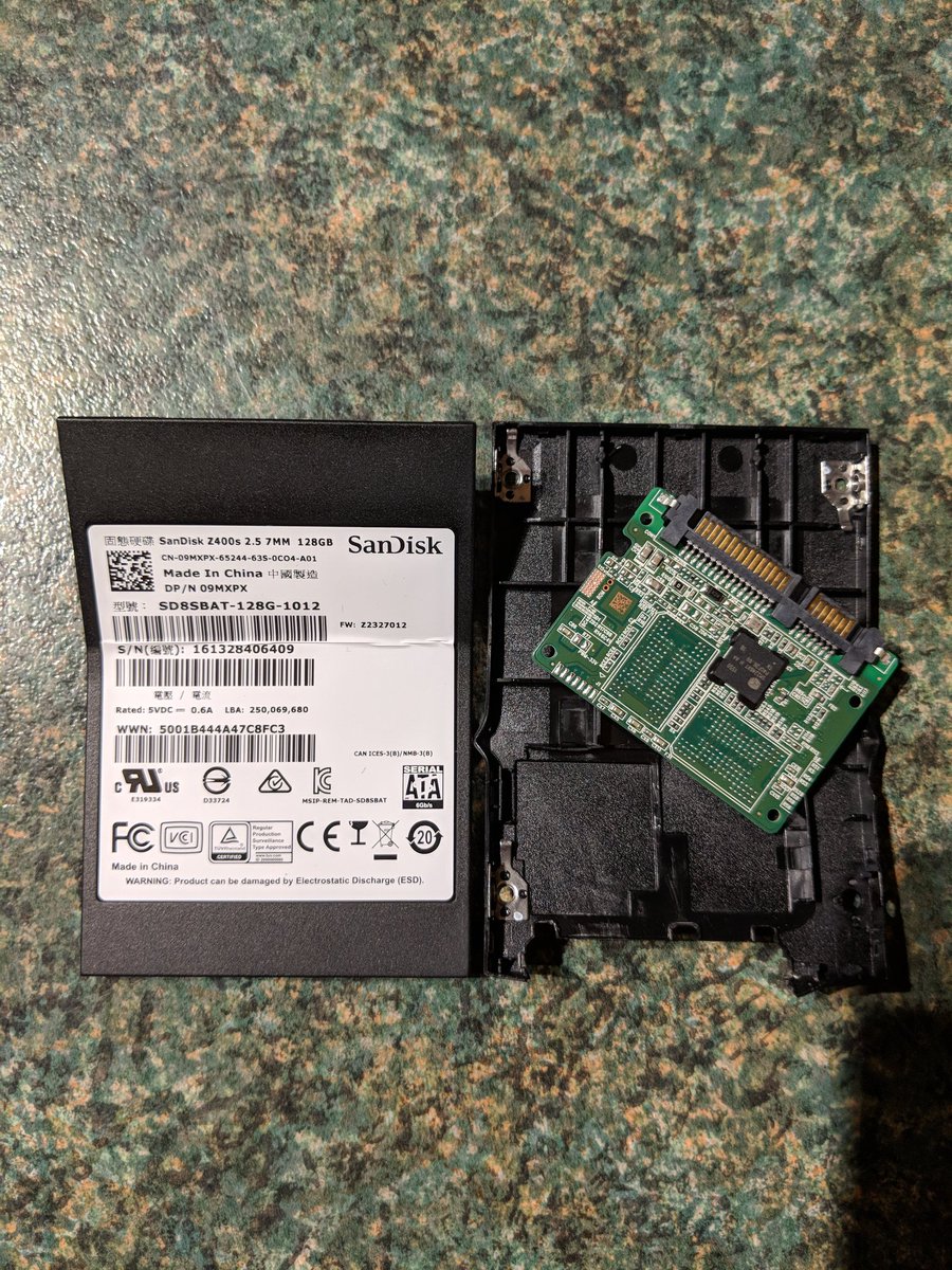 Strangely surprised by a tiny 2.5" ssd being mostly empty inside.... (SanDisk ssd, hardware failed)  - embedded image 